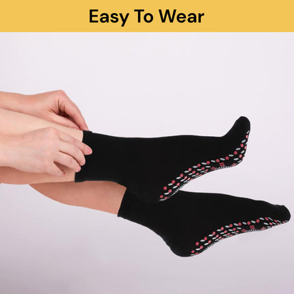 Pair Of Self Heating Socks